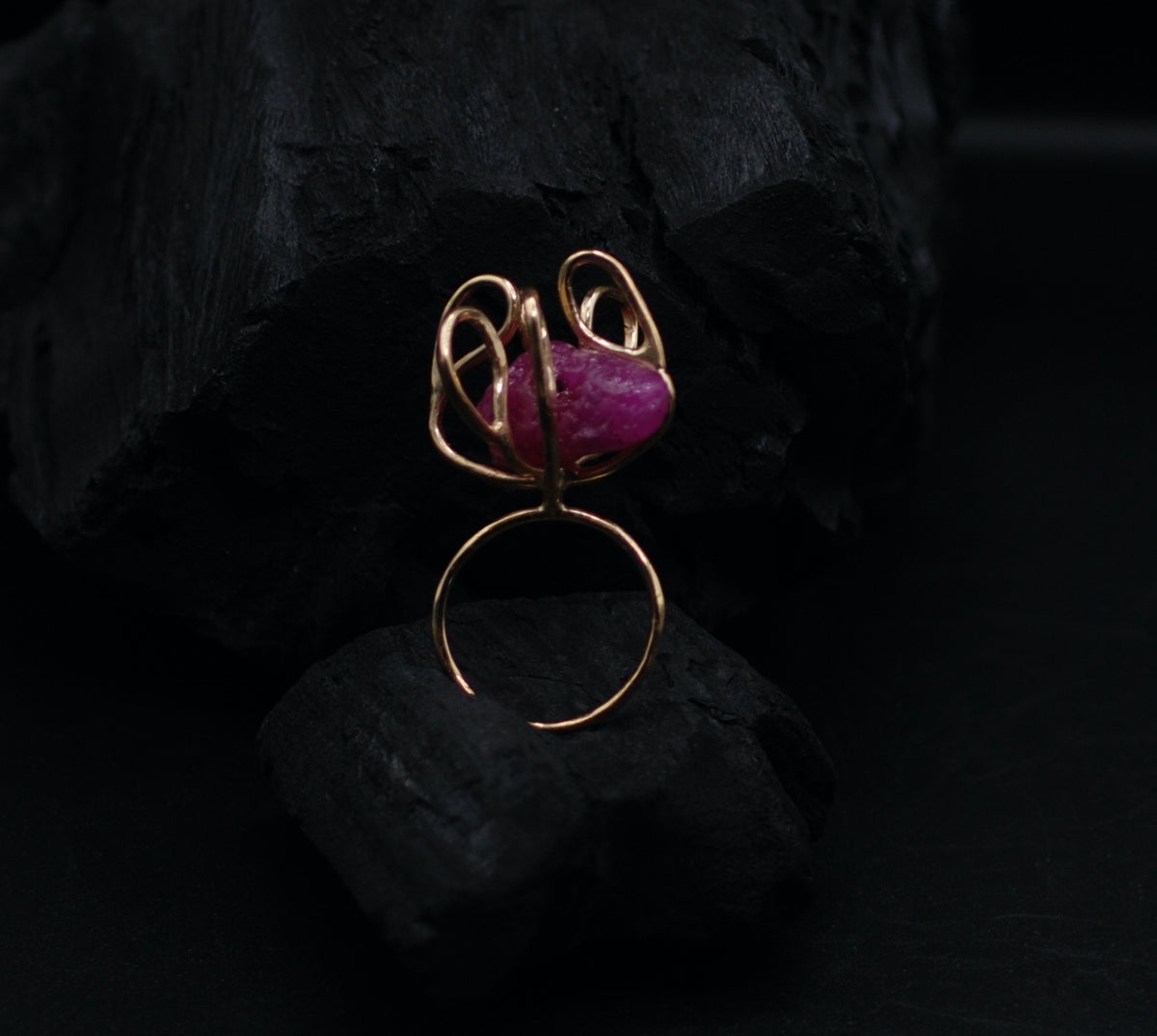 Gold plated silver cocktail ring witg a giant raw ruby stone