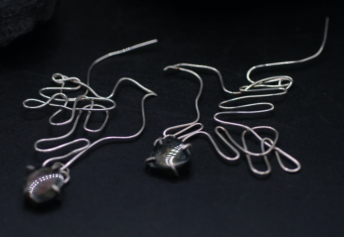 Earrings silver one dove one one hawk