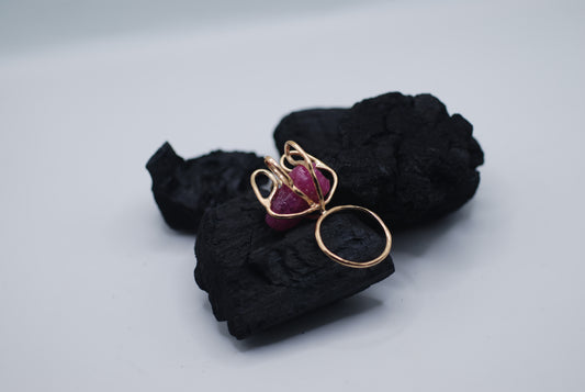 Gold plated silver cocktail ring witg a giant raw ruby stone