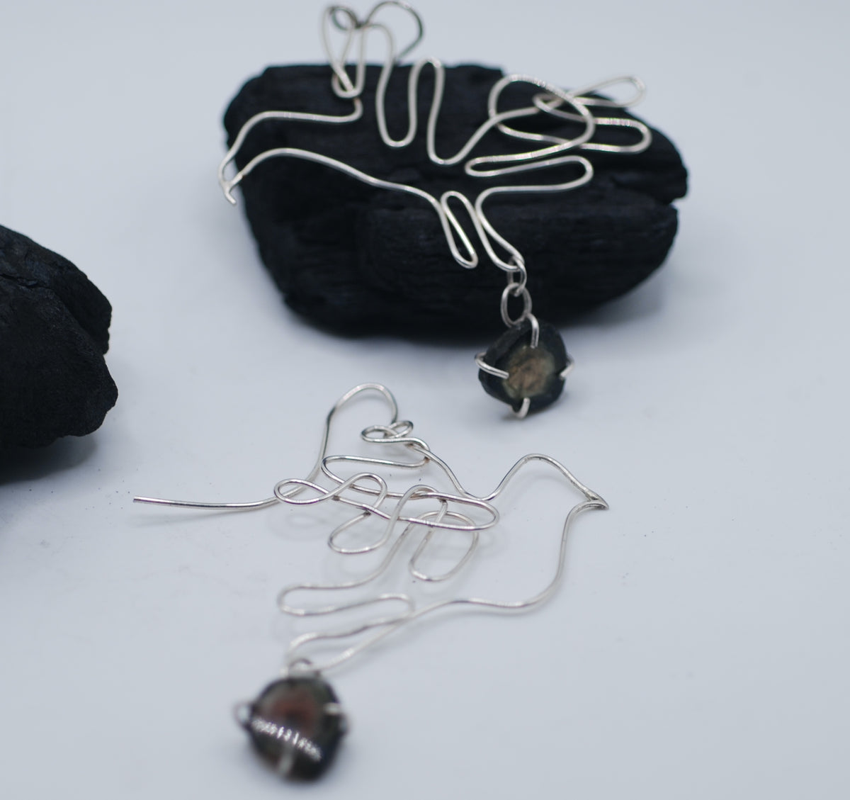 Earrings silver one dove one one hawk